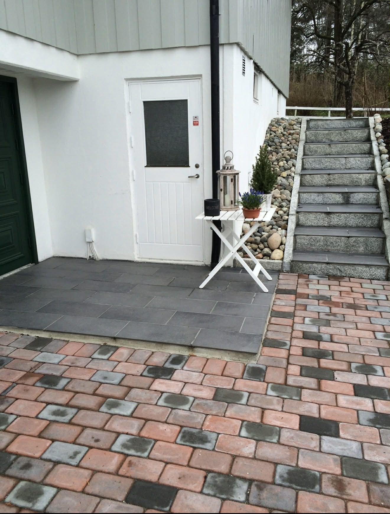 Hageområde med belegningsstein utført av Wünder AS, Drammen